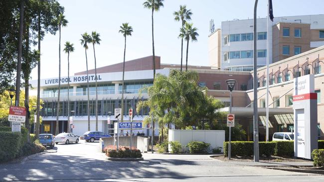 Two staff members at Liverpool Hospital have tested positive for coronavirus.