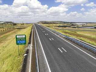 Road sign shows Toowoomba-Cecil Plains Rd and Wellcamp Airport exit on the Toowoomba Second Range Crossing.