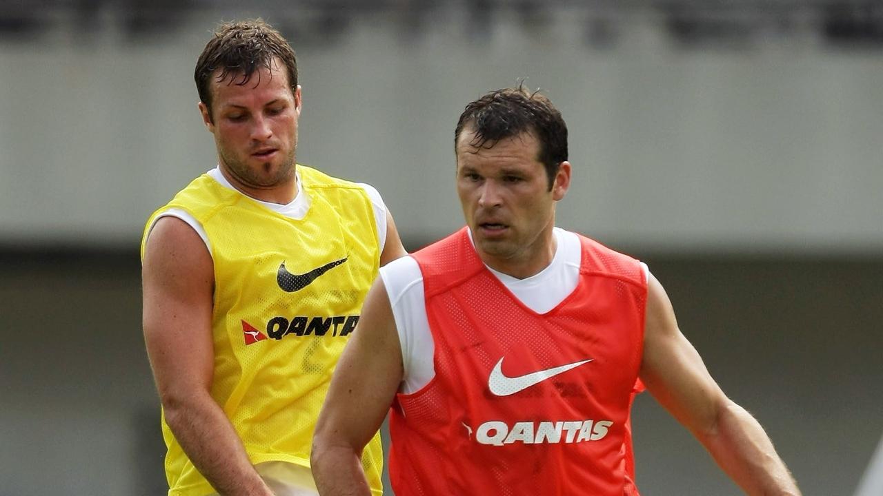 Mark Viduka and Lucas Neill in action during a Socceroos training session before the 2007 Asian Cup.