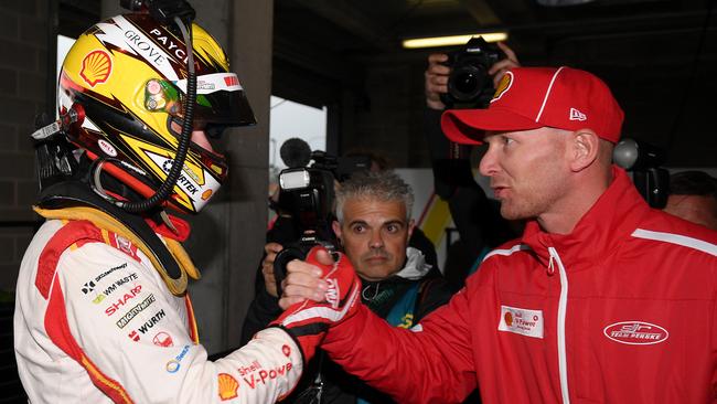 Scott McLaughlin is congratulated by his team after taking provisional pole.