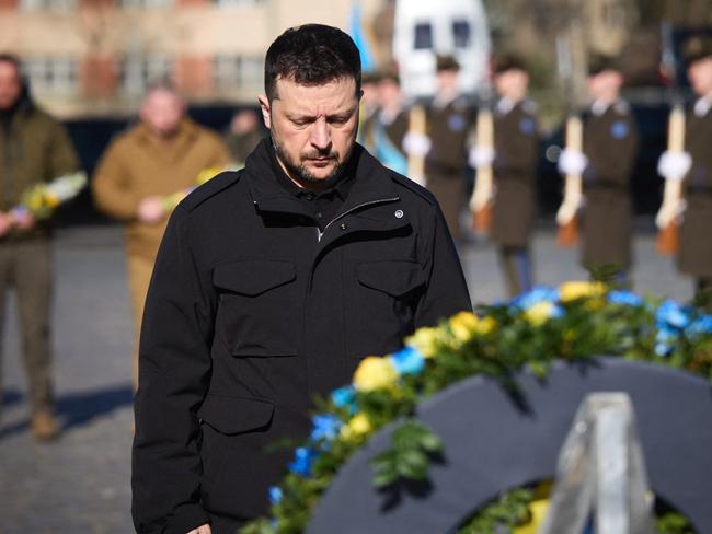 Ukrainian President Volodymyr Zelensky honouring the memory of fallen Ukrainian fighters at the Lychakiv Cemetery in Lviv, amid the Russian invasion of Ukraine. AFP