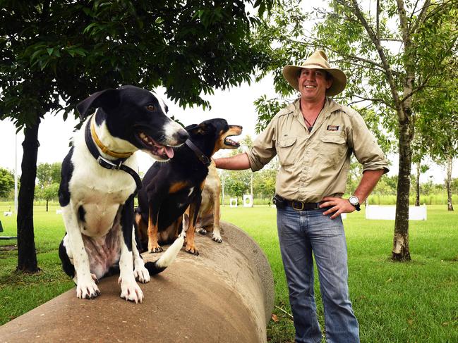 Will Green of Territory Animal Solutions with some of his rescue dogs and closest mates, Bonnie, Yap and Betty at the Marlow Lagoon Dog Park.