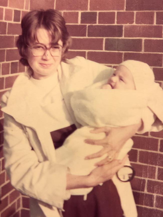 Roxlyn Bowie with one of her children 