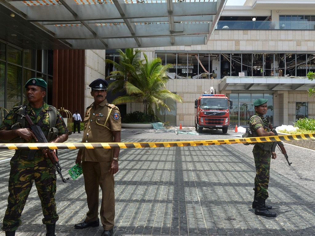 Sri Lankan security personnel stand guard at the cordoned off entrance to the luxury Shangri-La Hotel in Colombo. Picture: AFP