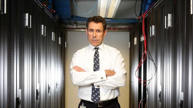 SNP Security’s Tom Roche in the company’s monitoring room at West Ryde. Picture: Adam Ward