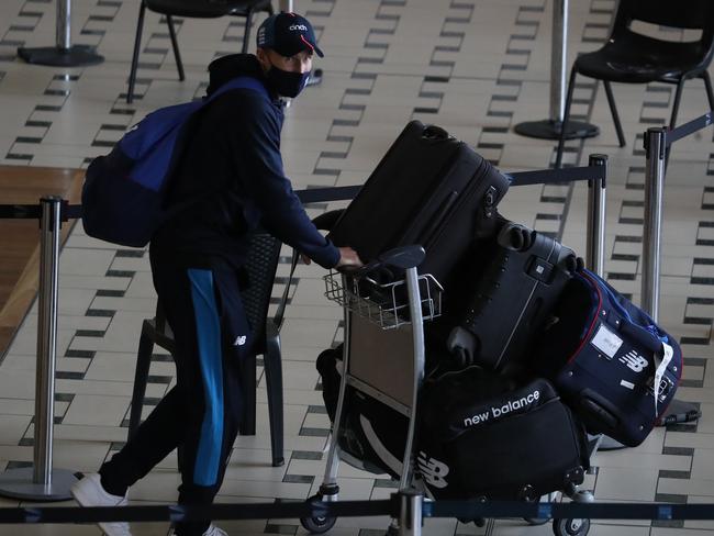 England captain Joe Root makes his way through the airport. Picture Annette Dew