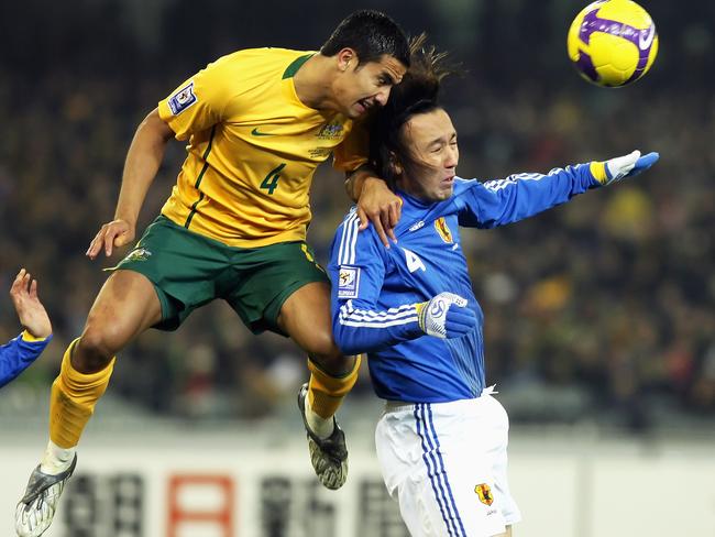 MELBOURNE, AUSTRALIA - JUNE 17: Tim Cahill of the Socceroos leaps over Marcus Tulio Tanaka of Japan to head the ball during the 2010 FIFA World Cup Asian qualifying match between the Australian Socceroos and Japan at the Melbourne Cricket Ground on June 17, 2009 in Melbourne, Australia. (Photo by Mark Dadswell/Getty Images)
