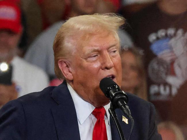 Former US President and 2024 Republican presidential candidate Donald Trump speaks during a campaign rally at the Georgia State University Convocation Center in Atlanta, Georgia, on August 3, 2024. (Photo by CHRISTIAN MONTERROSA / AFP)