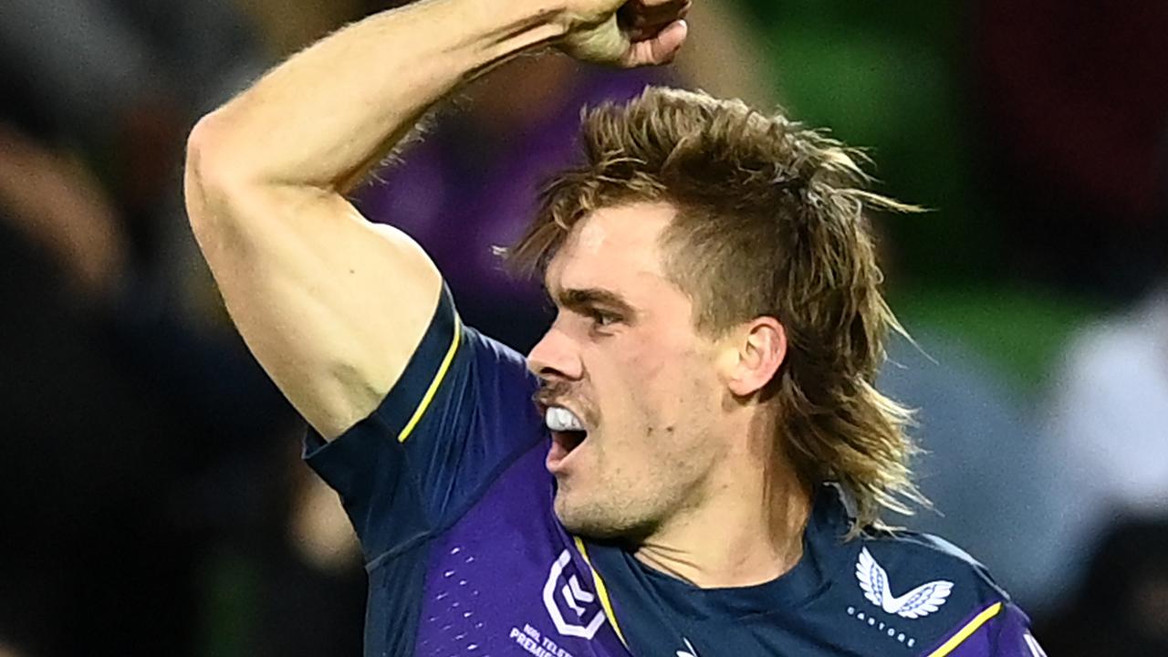 MELBOURNE, AUSTRALIA - APRIL 16: Ryan Papenhuyzen of the Storm celebrates after scoring a try during the round six NRL match between the Melbourne Storm and the Sydney Roosters at AAMI Park on April 16, 2021, in Melbourne, Australia. (Photo by Quinn Rooney/Getty Images)