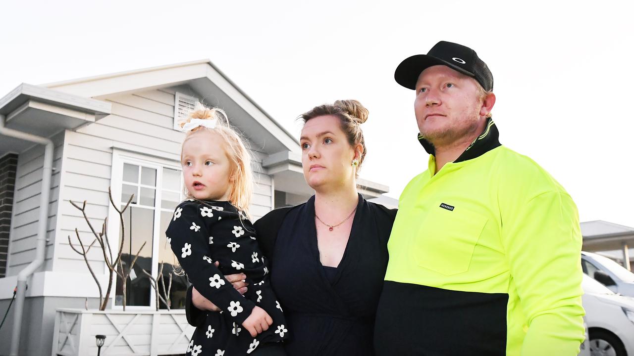 Hayden Poulter pictured with his partner Charlotte and daughter, Delilah, 4 at their family home. Photo Patrick Woods