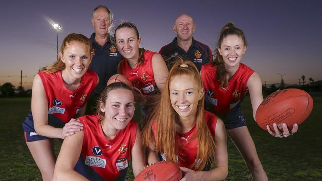 The seven Grants of Old Brighton Grammarians: Katie and Sophie (front) Maddie, Annie and Emily (middle) and their dads, Peter and Andrew. Picture: Wayne Taylor.