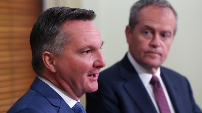 Labor leader Bill Shorten (R) and Shadow Treasurer Chris Bowen (L) hold a press conference in Melbourne, Friday, October 12, 2018. Labor are revealing today the ALP will back the Government's plan to fast-track tax cuts to small businesses. (AAP Image/David Crosling) NO ARCHIVING,