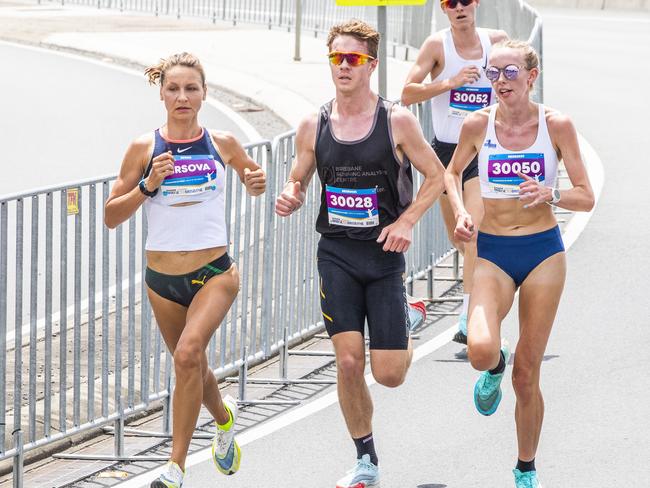 5km winner Olga Firsova with Cameron Tyne and Cara Feain-Ryan taking part in the The Sunday Mail Bridge to Brisbane, Sunday, November 7, 2021 - Picture: Richard Walker