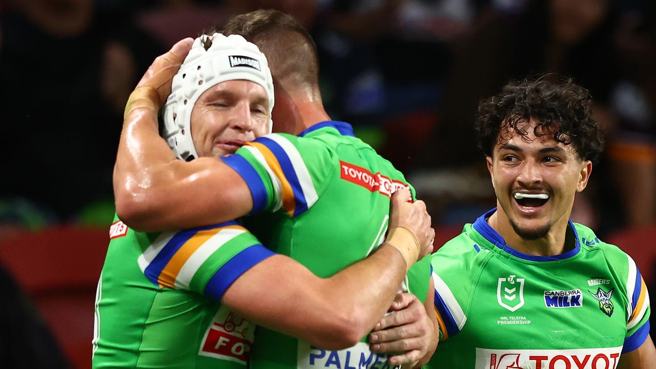 BRISBANE, AUSTRALIA - MAY 05: Xavier Savage of the Raiders celebrates with team mates after scoring a try during the round 10 NRL match between Canterbury Bulldogs and Canberra Raiders at Suncorp Stadium on May 05, 2023 in Brisbane, Australia. (Photo by Chris Hyde/Getty Images)