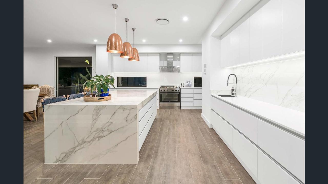 The kitchen area of the Surfers Paradise mansion which has been put up for sale by Nicole Bricknell.