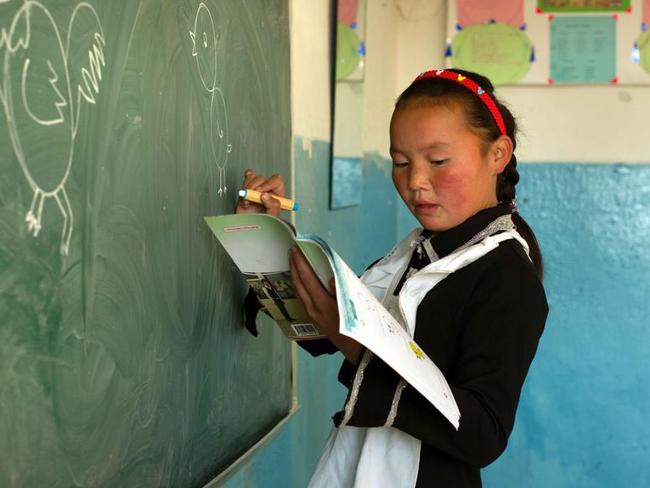 PIWhen she is not training eagles, Aisholpan is a straight-A student. Picture: Asher Svidensky