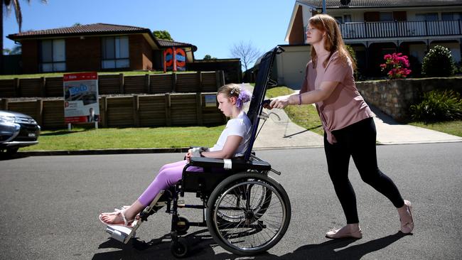 Helen Owen with her daughter Bella, who suffers from PCDH 19, an extreme and life threatening type of epilepsy. Picture: Justin Sanson