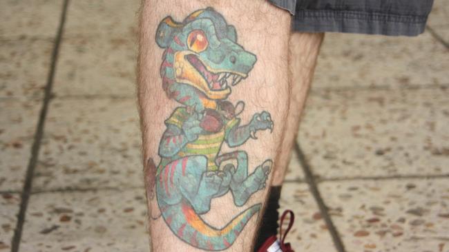 Paul Briske's tattoo of a velociraptor dressed as The Fresh Prince of Bel-Air. Picture: Eugene Boisvert