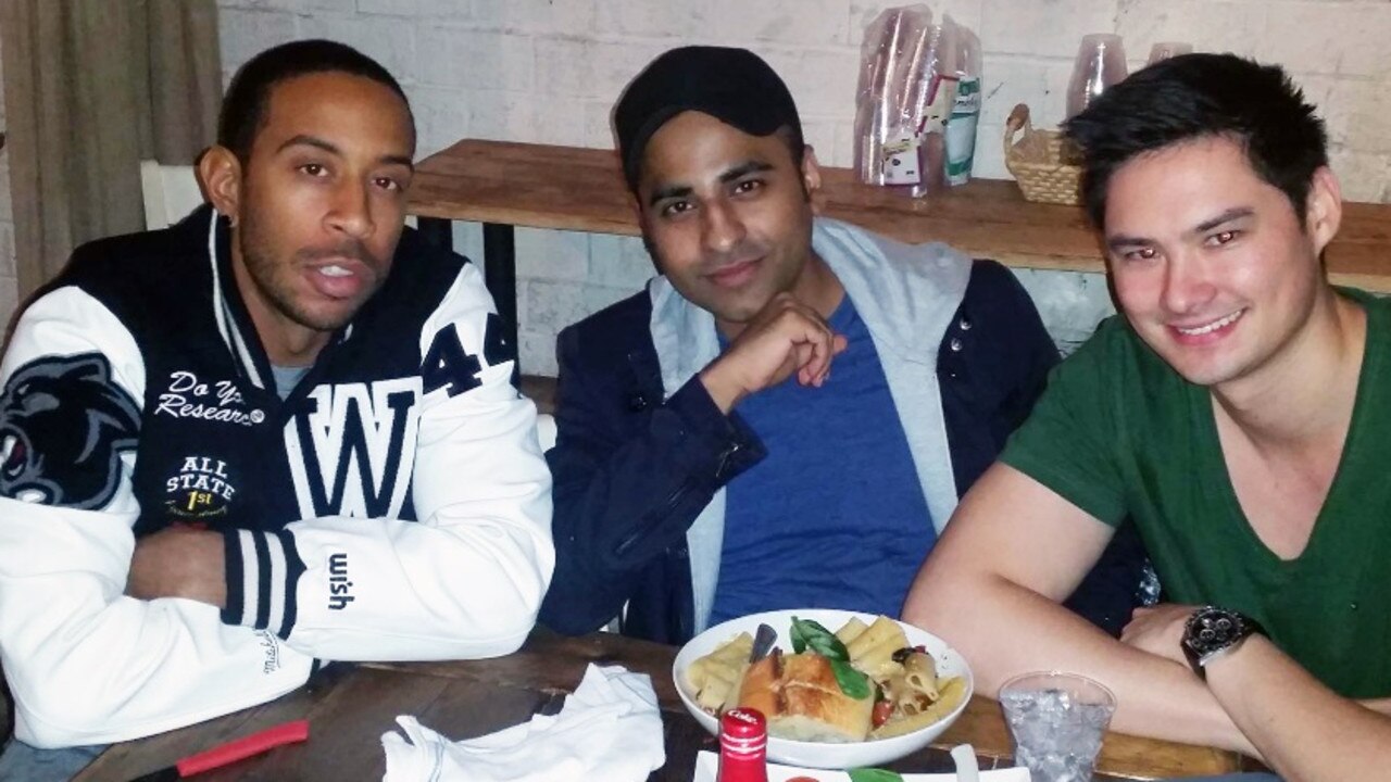 … and with rapper Ludacris.