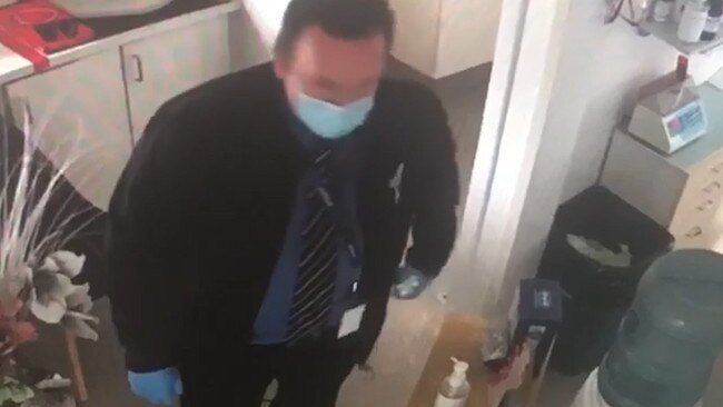 Victoria Police detective caught on camera with toothpaste from a dentist. Source: CCTV Supplied.