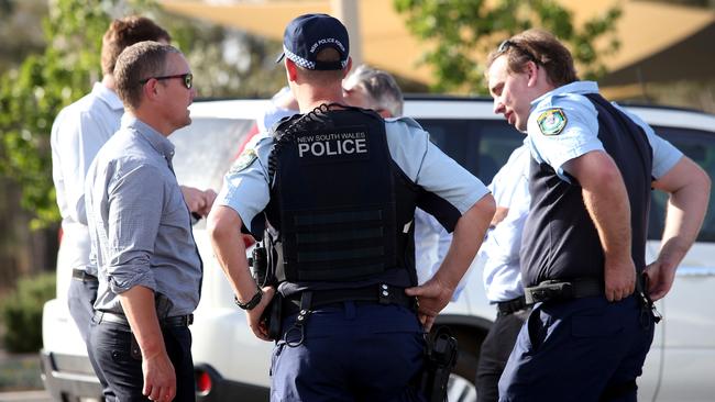 Detectives arrive at the North Rothbury Fire scene last week. Picture: Peter Lorimer.