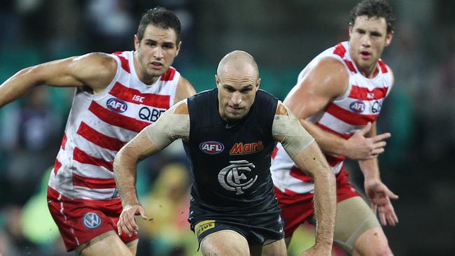 Chris Judd battling Sydney on that Friday night in April 2011.