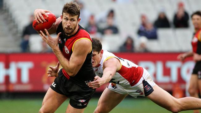 Cale Hooker tries to shake off an Angus Brayshaw tackle. Picture: Mark Stewart