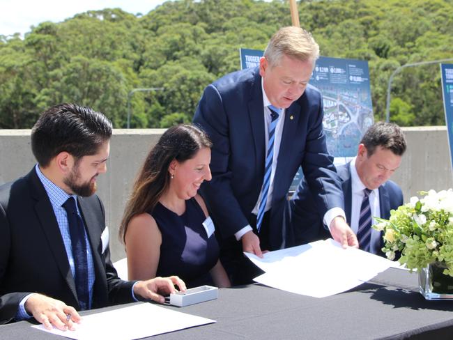 The signing of the Heads of Agreement. 