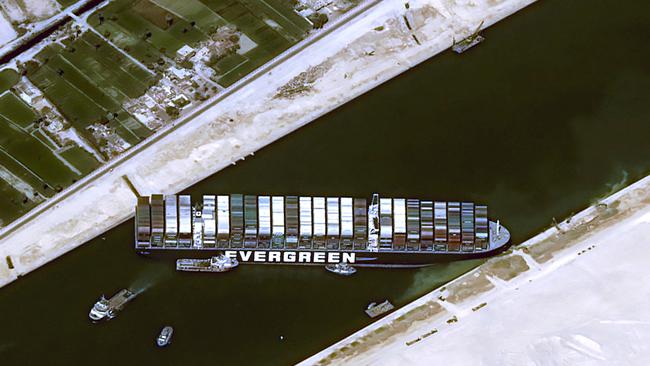 This satellite image shows the 400-metre long MV Evergreen lodged sideways and impeding all traffic across the waterway of Egypt's Suez Canal. Picture: AFP/CNES 2020