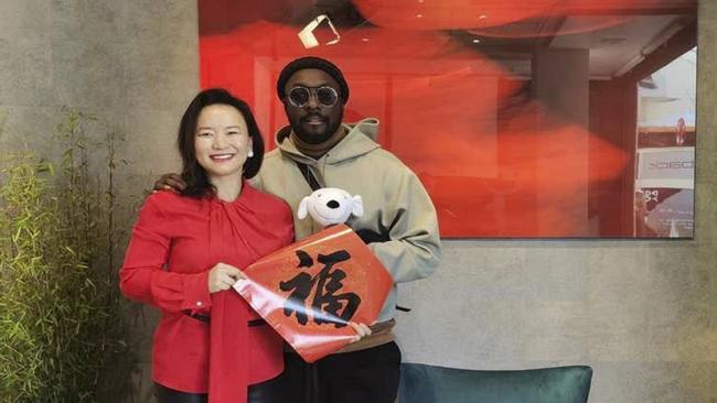 Journalist Cheng Lei with American rapper will.i.am.