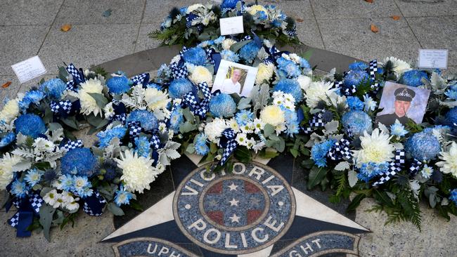 Wreaths laid at the Victoria Police Memorial on St Kilda Road to mark one year since four officers were killed on the Eastern Freeway. Picture: NCA NewsWire/Andrew Henshaw