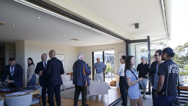 Action at 25/40 Maria St, Petersham. The Apartment with expansive views sold for 1,610,000 dollars. Auctioneer Clarence White sold the property 350,000 dollars over the reserve of 1,260,000 dollars. Picture: David Swift.