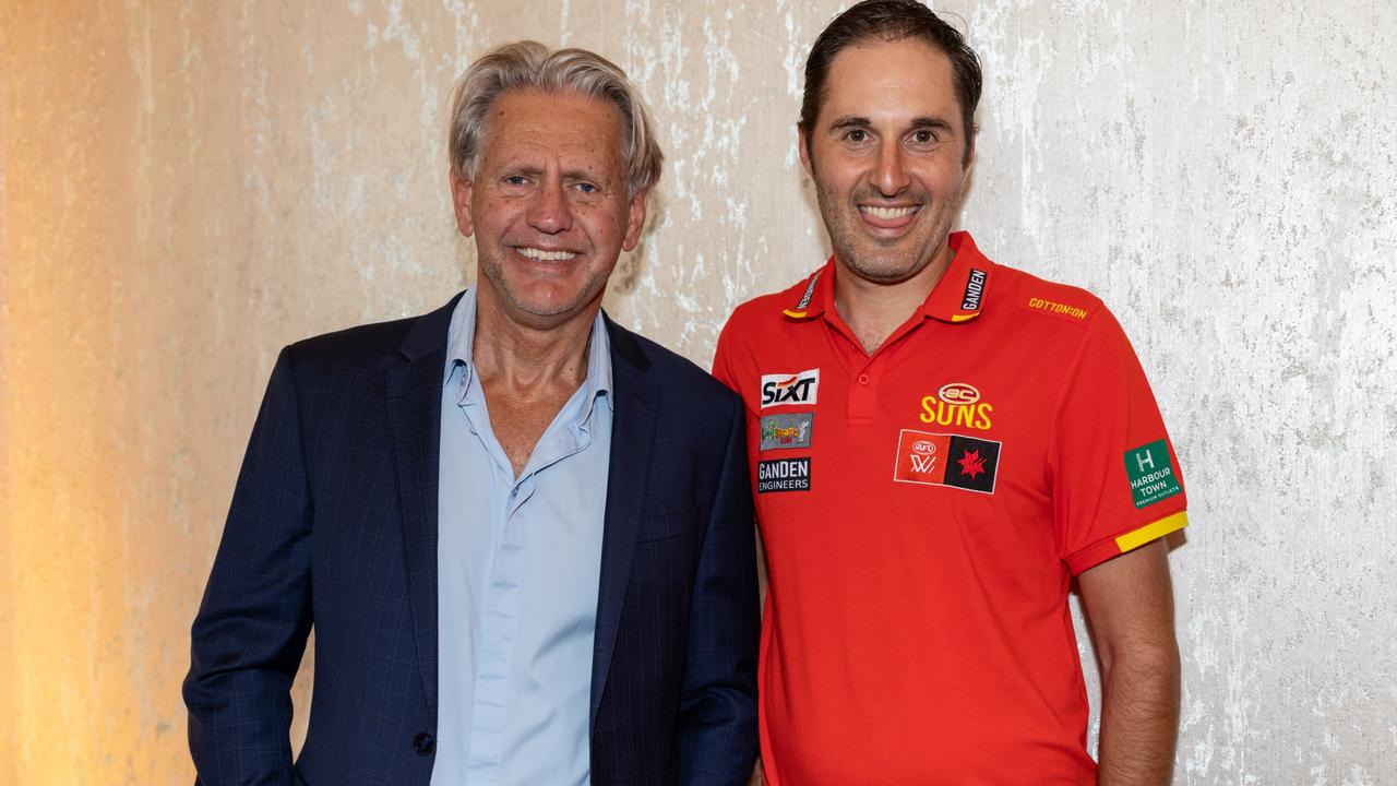 Gold Coast AFLW coach Cameron Joyce (right, pictured with Suns chairman Bob East) has been sacked with two years remaining on his contract. Picture: Celeste Humphrey.