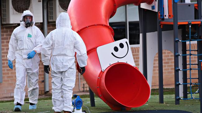 A crew cleans up Werrington Public School in Sydney’s west on Thursday. Picture: Adam Yip