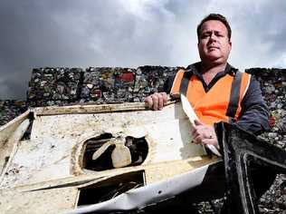 BIN PROBLEMS: Lismore Material Recycling Facility commercial services coordinator Kevin Trustum is pleading with residents to be mindful of the waste they throw in recycling bins. Picture: Marc Stapelberg