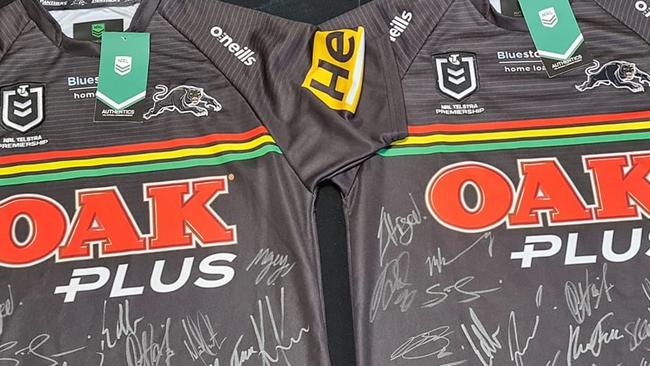 The two signed jerseys the Penrith Panthers sent to Michael Warburton's family.