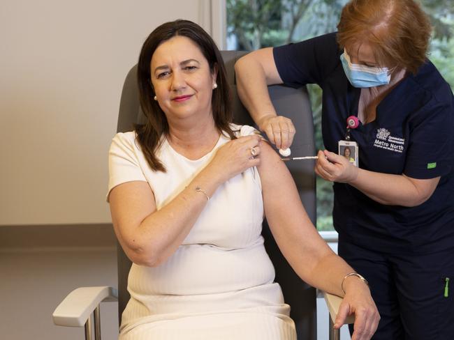 BRISBANE AUSTRALIA - NewsWire Photos JUNE 7, 2021: Queensland Premier Annastacia Palaszczuk is given the her COVID-19 vaccination by clinical nurse Dawn Pedder at the Surgical Treatment Rehabilitation Service Centre in Brisbane. NCA NewsWire / Sarah Marshall