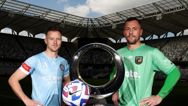 Melbourne City FC captain Scott Jamieson (L) and Central Coast Mariners captain Danny Vukovic (R) pose with the A-League Men's trophy during the A-League Men's 2023 Grand Final Media Opportunity at CommBank Stadium on June 02, 2023 in Sydney, Australia. (Photo by Matt King/Getty Images)