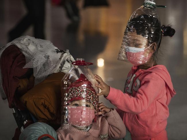 Chinese children are wearing makeshift protection from the coronavirus. Picture: Kevin Frayer