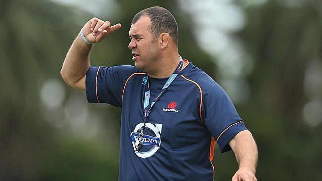 SYDNEY, AUSTRALIA - APRIL 15: Waratahs coach Michael Cheika speaks to players during a Wa