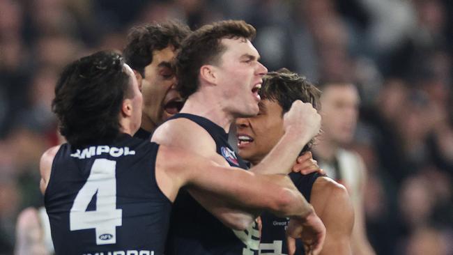 MELBOURNE, AUSTRALIA – AUGUST 03: Blake Acres of the Blues celebrates kicking a goal during the round 21 AFL match between Collingwood Magpies and Carlton Blues at Melbourne Cricket Ground, on August 03, 2024, in Melbourne, Australia. (Photo by Daniel Pockett/Getty Images)