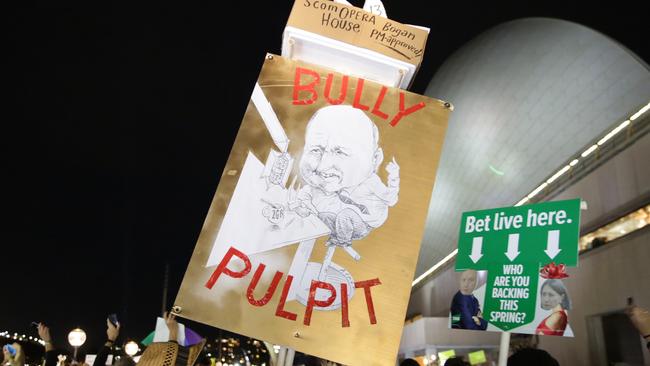 Alan Jones’ hectoring of Opera House CEO Louise Heron has prompted a backlash, with signs from protesters depicting him as a bully. Picture: Christian Gilles