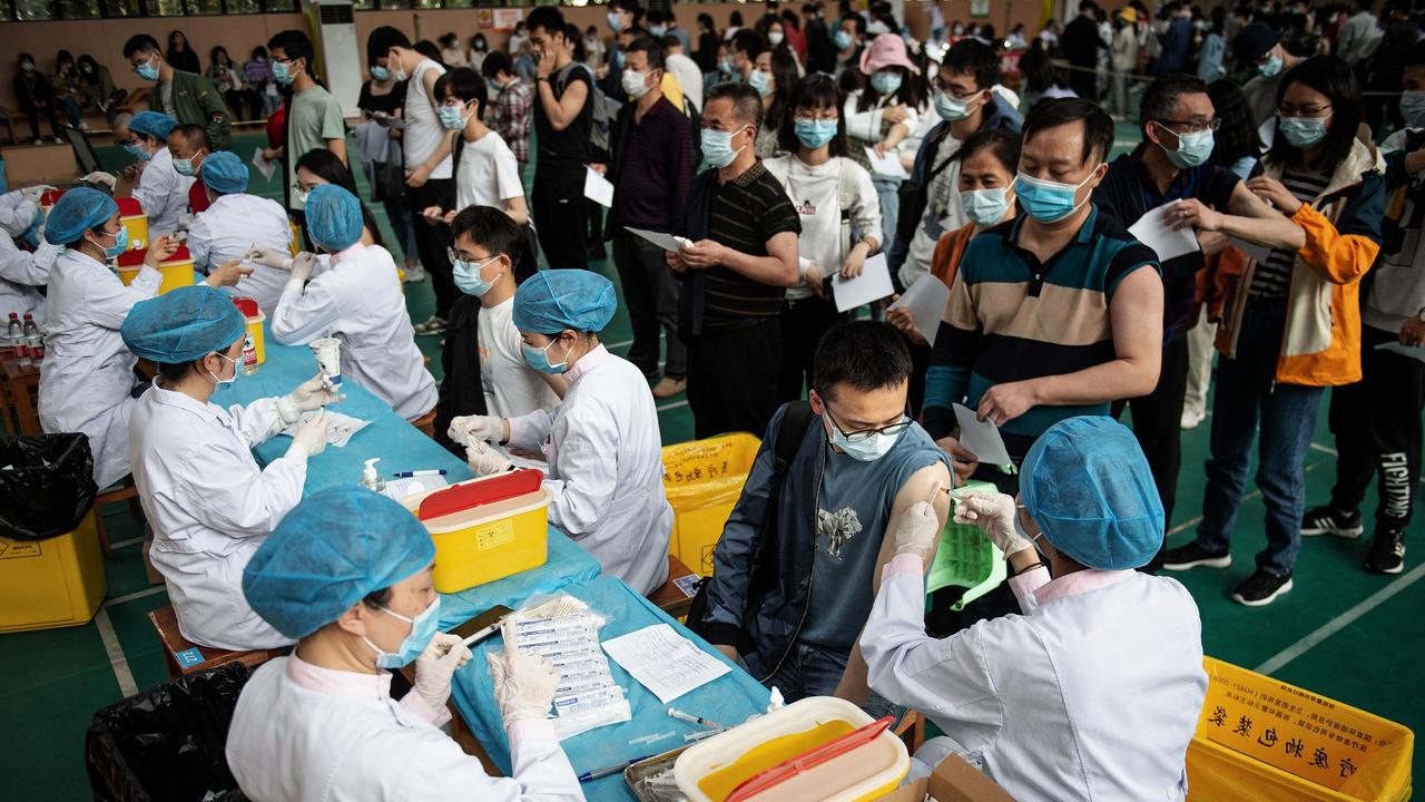 China has now administered more than a billion doses of Covid vaccines, the country's health authority said this week. Picture: STR / AFP.