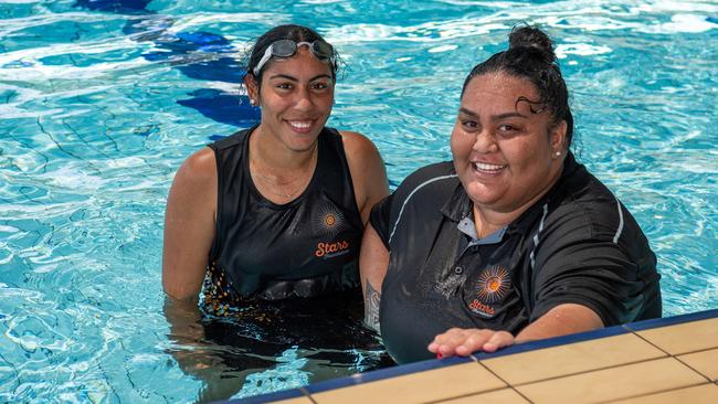 Lah Walters and Jo De La Couer as Olympians and scholarship coaches run training sessions for Katherine youth at RAAF Base Tindal. Picture: Pema Tamang Pakhrin