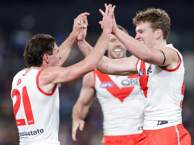 Fellow young players like Errol Gulden have shown Sheldrick the path to crack the AFL. Picture: Russell Freeman/AFL Photos via Getty Images