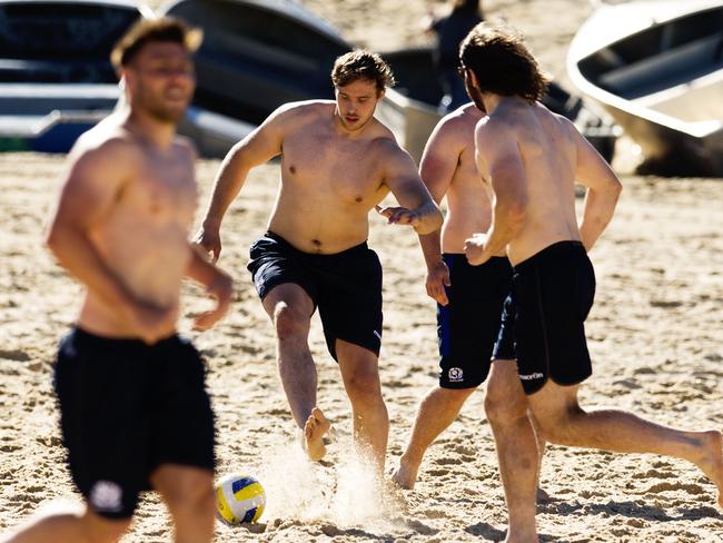 Jonny Gray kicks the ball during a Scotland recovery session at Coogee Beach. Picture: Jenny Evans