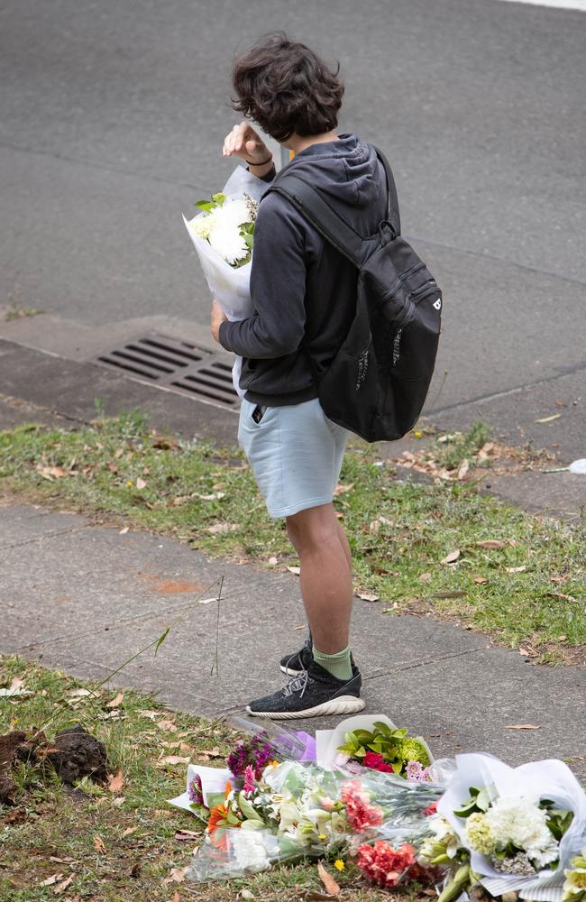 An influx of students started to pay tribute to their friend after school.