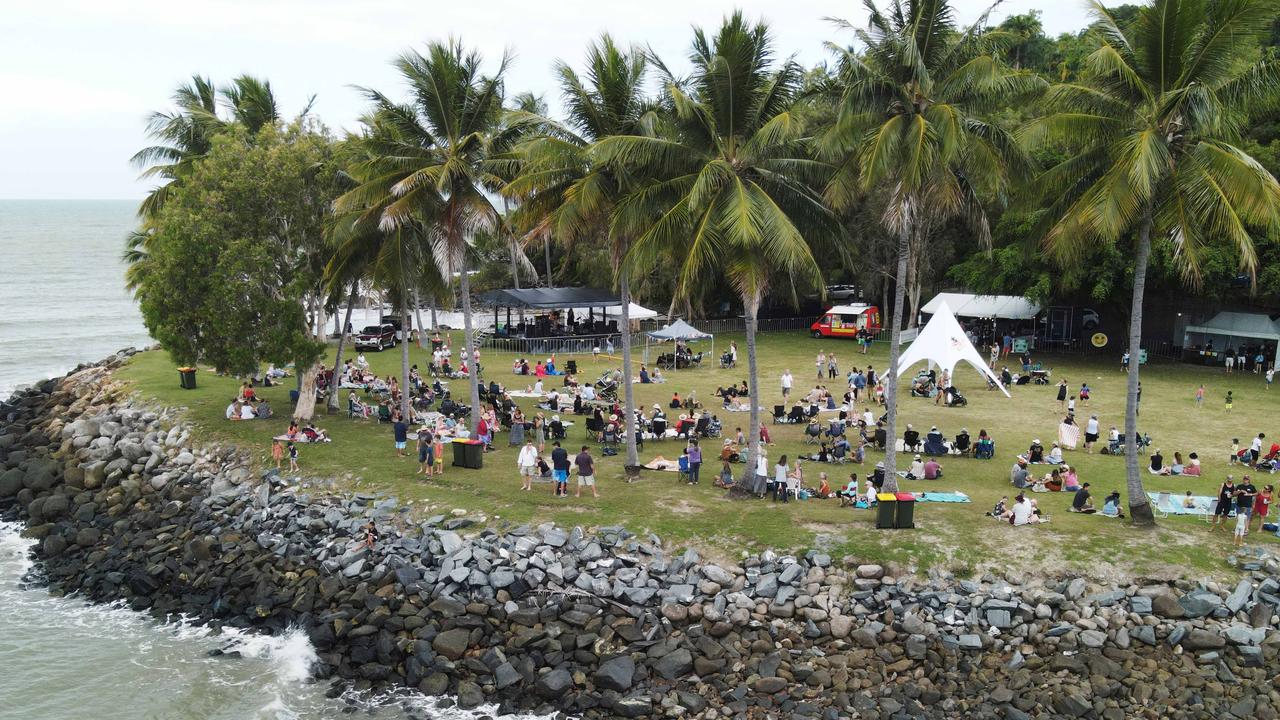 Festival goers listen to the tunes of local acoustic duo Seachange, the opening act of Plantation Picnic in the Park, the final event of the 2021 Port Douglas Carnivale. Picture: Brendan Radke