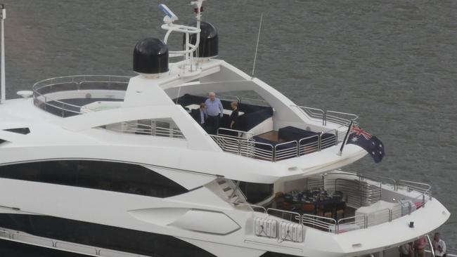 Clive Palmer aboard his superyacht in the Brisbane River.