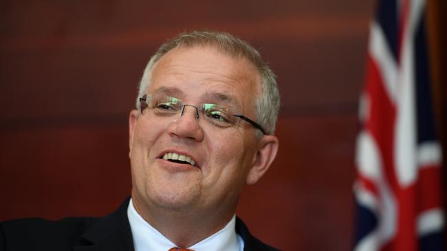 Australian Prime Minister Scott Morrison says he will strip councils of the ability to hold citizenship ceremonies if they refuse to hold them on Australia Day. Picture: AAP